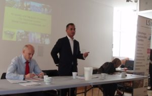 Murad Qureshi (centre) speaking at the London Sustainability Conference