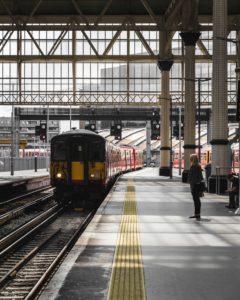 woman standing in train station