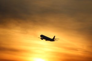 silhouette of flying airplane