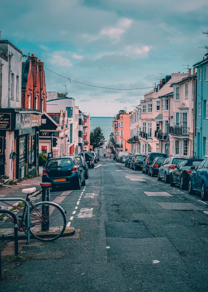 cars parked on street near buildings during daytime