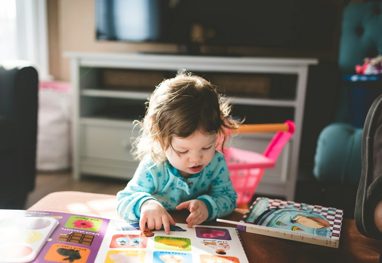 child reading book